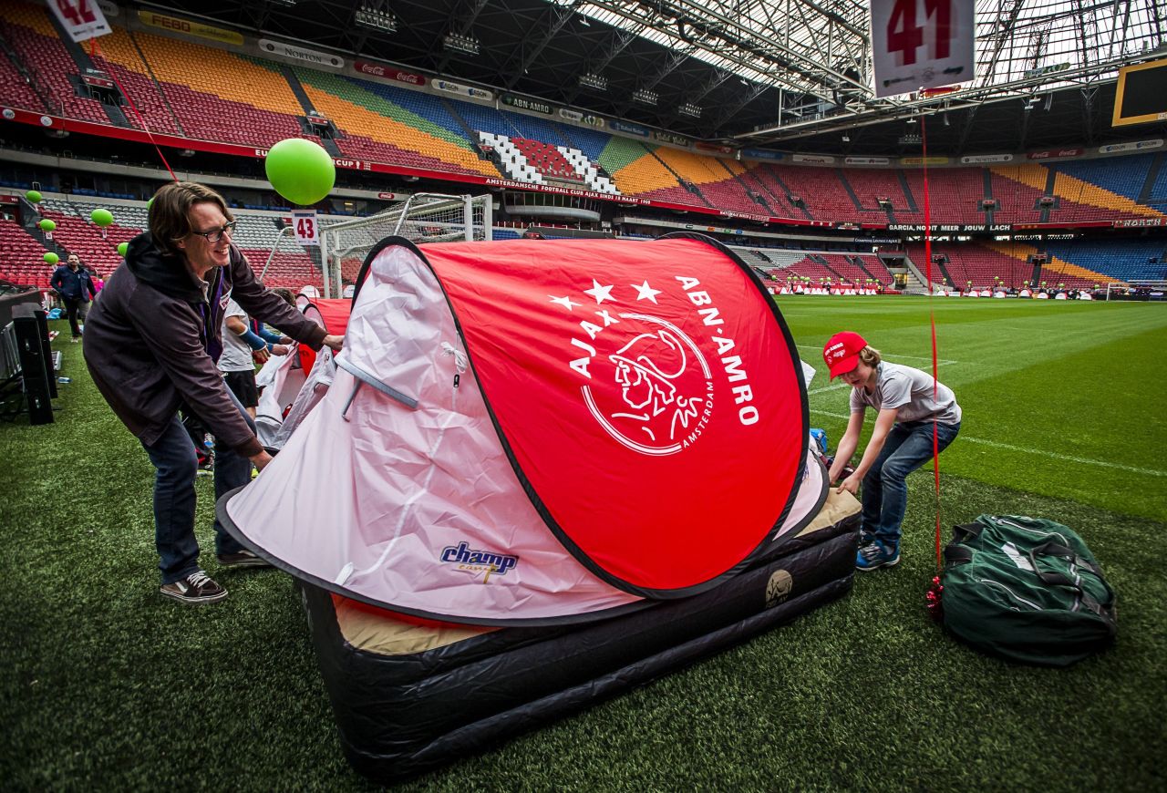 It was a family affair this weekend at Dutch club Ajax. The Amsterdam club's fans were invited to camp pitch side overnight prior to the team's match against Cambuur Leeuwarden. And on Sunday the Ajax players walked out with their mothers instead of mascots to celebrate Mother's Day in the Netherlands.