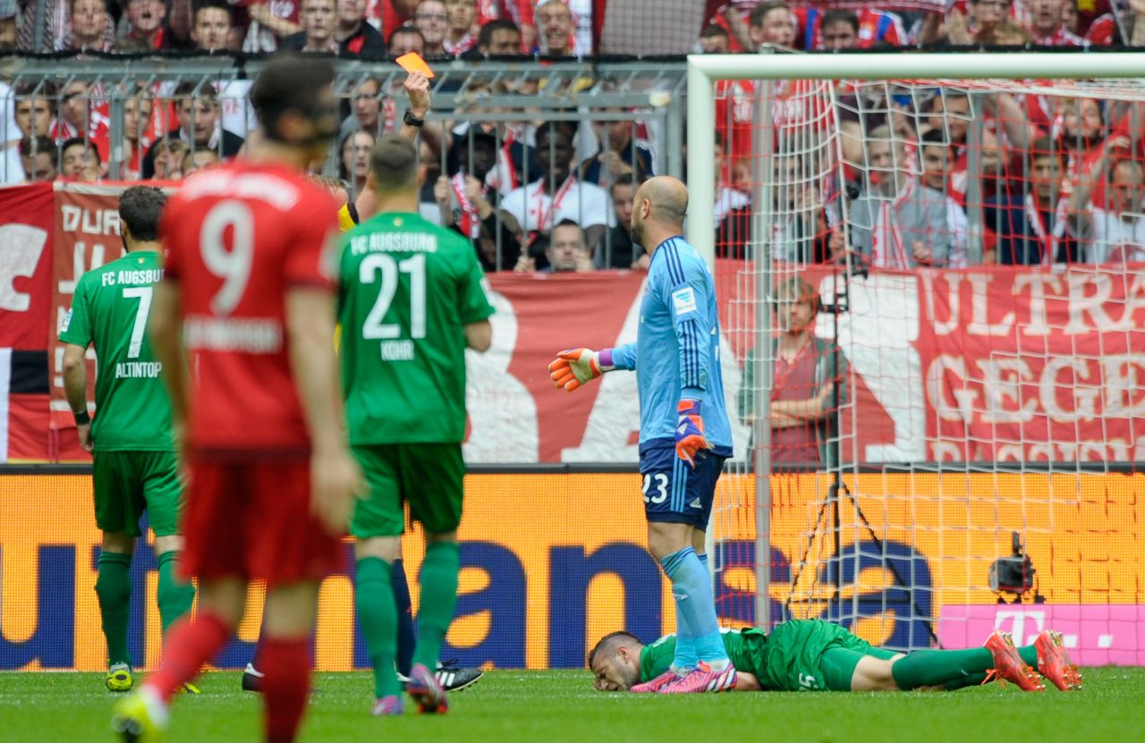 Bayern Munich's Pepe Reina is sent off after just 13 minutes in his side's 1-0 home defeat against Bundesliga rivals Augsburg. The German champions have now lost three games in a row and welcome Barcelona next looking to overturn a 3-0 first-leg deficit in their Champions League semi.