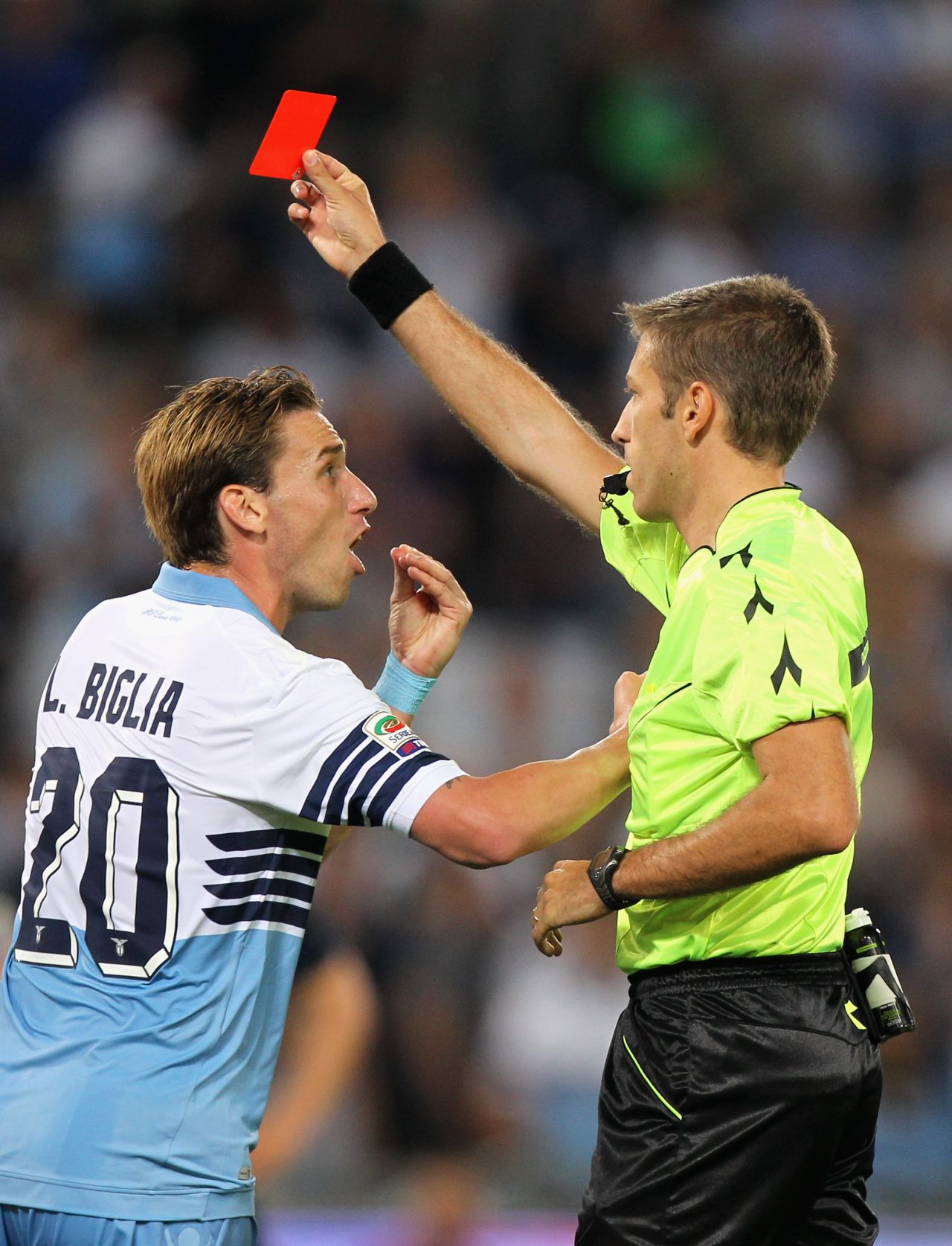 Lucas Biglia remonstrates with referee Davide Massa after Mauricio's sending off in the first half in the game between Lazio and Inter Milan. Lazio would go on to finish the game with nine men after Federico Marchetti saw red in the second half.