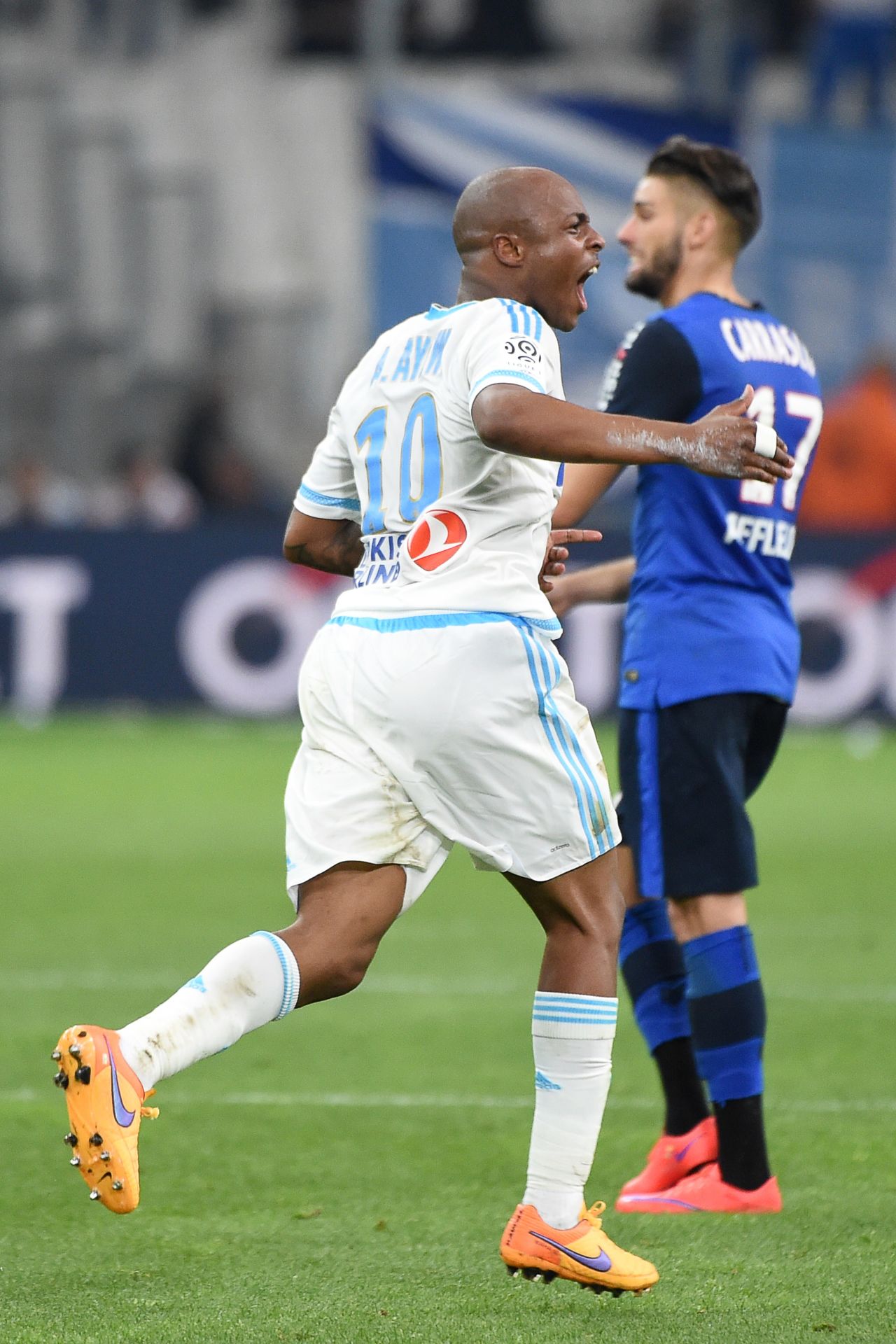 Andre Ayew celebrates drawing Marseille level in their Ligue 1 match against Monaco. Romain Alessandrini completed the comeback in the 87th minute to secure a first win in five matches for Marcelo Bielsa's side.