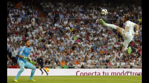 Real Madrid's Gareth Bale controls the ball during a Spanish league match against Valencia on Saturday, May 9. The teams tied 2-2, severely denting Madrid's hopes of winning the league.
