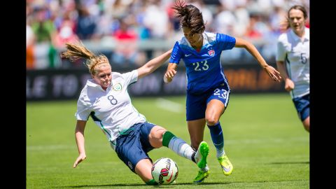 Ireland's Ruesha Littlejohn slides into Christen Press of the United States during an international friendly match Sunday, May 10, in San Jose, California. The Americans won 3-0.