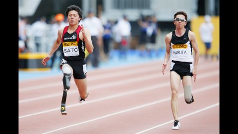 Keita Sato and Jun Haruta run the 100-meter dash on Sunday, May 10, during the Seiko Golden Grand Prix in Kawasaki, Japan.