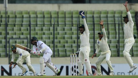 Pakistani cricketers make an unsuccessful appeal while Bangladesh's Mushfiqur Rahim bats Thursday, May 7, in Dhaka, Bangladesh. Pakistan would eventually win the Test match by 328 runs.