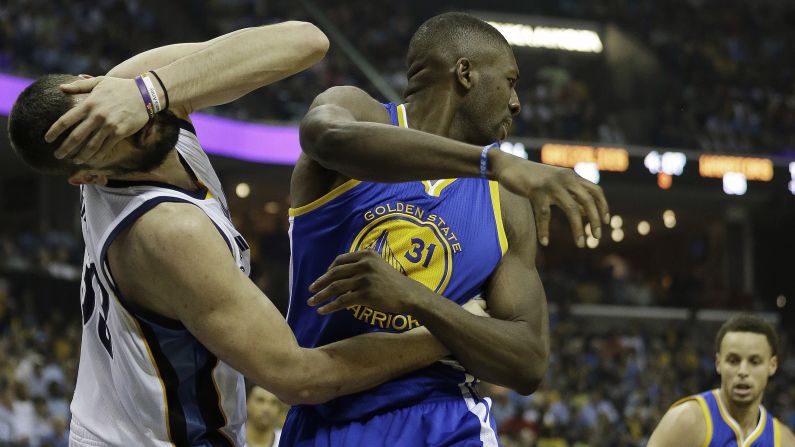 Memphis center Marc Gasol reacts to contact from Golden State's Festus Ezeli during Game 3 of their NBA playoff series on Saturday, May 9.