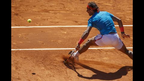 Rafael Nadal returns the ball to Simone Bolelli during their match at the Madrid Open on Thursday, May 7.