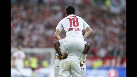 Stuttgart's Filip Kostic jumps on the back of a teammate as he celebrates scoring a goal against Mainz during a German league match in Stuttgart on Saturday, May 9. Stuttgart won the match 2-0. <a href="http://www.cnn.com/2015/05/05/sport/gallery/sports-what-a-shot-0505/index.html" target="_blank">See 38 amazing sports photos from last week</a>