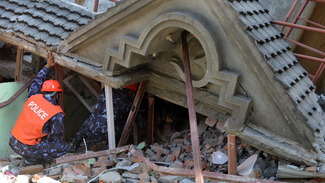 Rescue teams search for survivors in Kathmandu on May 12.