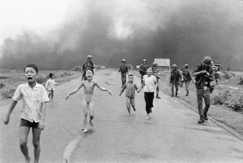 Associated Press photographer Nick Ut photographed terrified children running from the site of a napalm attack during the Vietnam War in June 1972. A South Vietnamese plane accidentally dropped napalm on its own troops and civilians. Nine-year-old Kim Phuc, center, ripped off her burning clothes while fleeing. The image communicated the horrors of the war and contributed to the growing anti-war sentiment in the United States. After taking the photograph, Ut took the children to a hospital.