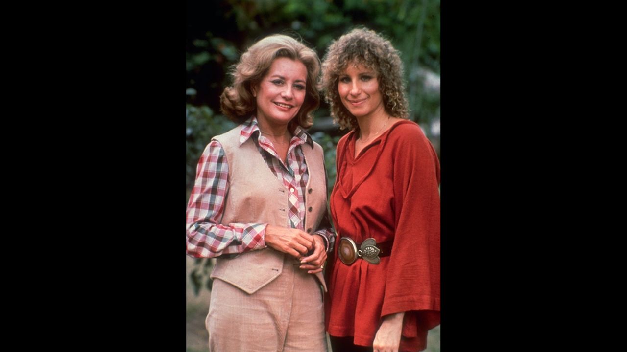 In October 1976, Barbara Walters, seen at left with actress Barbra Streisand, became the first woman to co-anchor a major network evening newscast. ABC made history before she even went on air, signing Walters to a $1 million annual contract to make her the highest-paid journalist at that time. She only co-anchored the show for a year and a half, but she would go on to host ABC shows such as "20/20," "The View" and "Barbara Walters Specials" until her retirement in 2014.