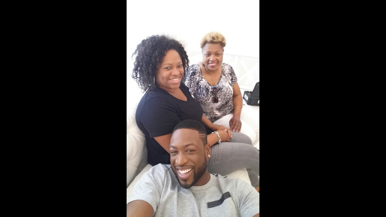 "My day is filled with 3 photoshoots and some other things but i just got the energy i needed when i got a special surprise visit from my mother," <a href="https://instagram.com/p/2WOjgklCIE/" target="_blank" target="_blank">basketball star Dwyane Wade said on Instagram</a> on Wednesday, May 6. That's Wade's mother in the back, next to Wade's friend Lisa Joseph Metelus.