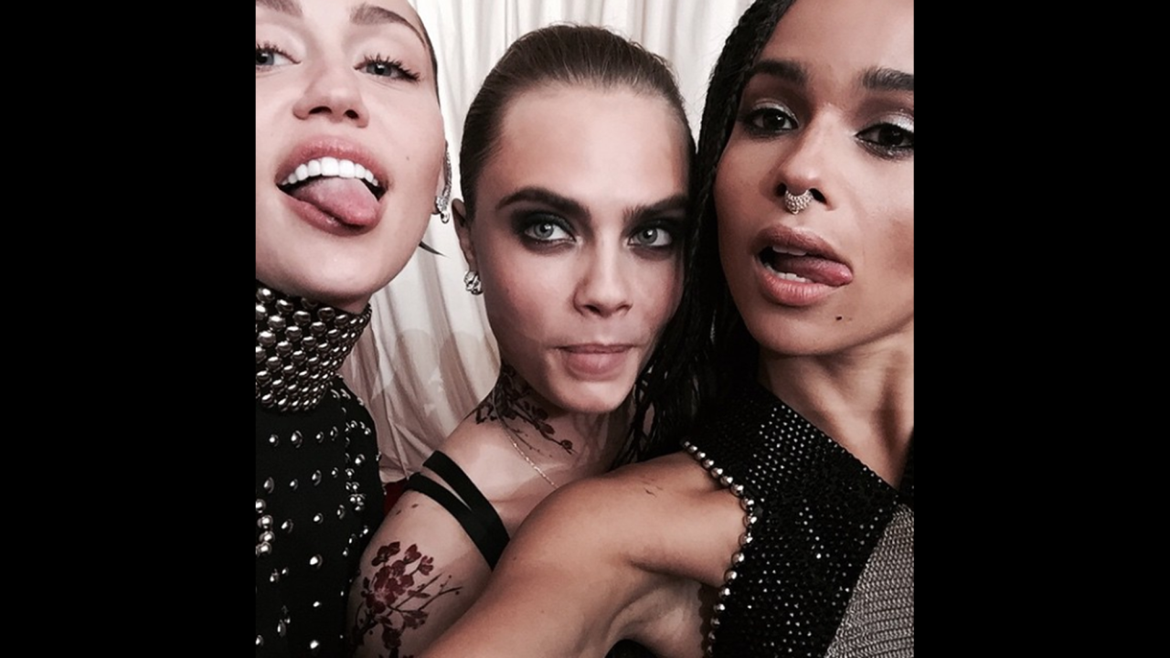Model Cara Delevingne, center, <a href="https://instagram.com/p/2XG75zDKNP/" target="_blank" target="_blank">posted this "#MetBall" selfie</a> with pop star Miley Cyrus, left, and actress Zoe Kravitz on Wednesday, May 6.