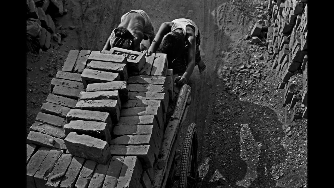 Children work at a brickyard in Chittagong.