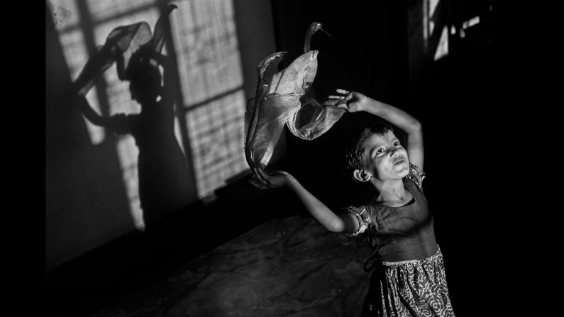 Poli, 6, works at a home in Chittagong.