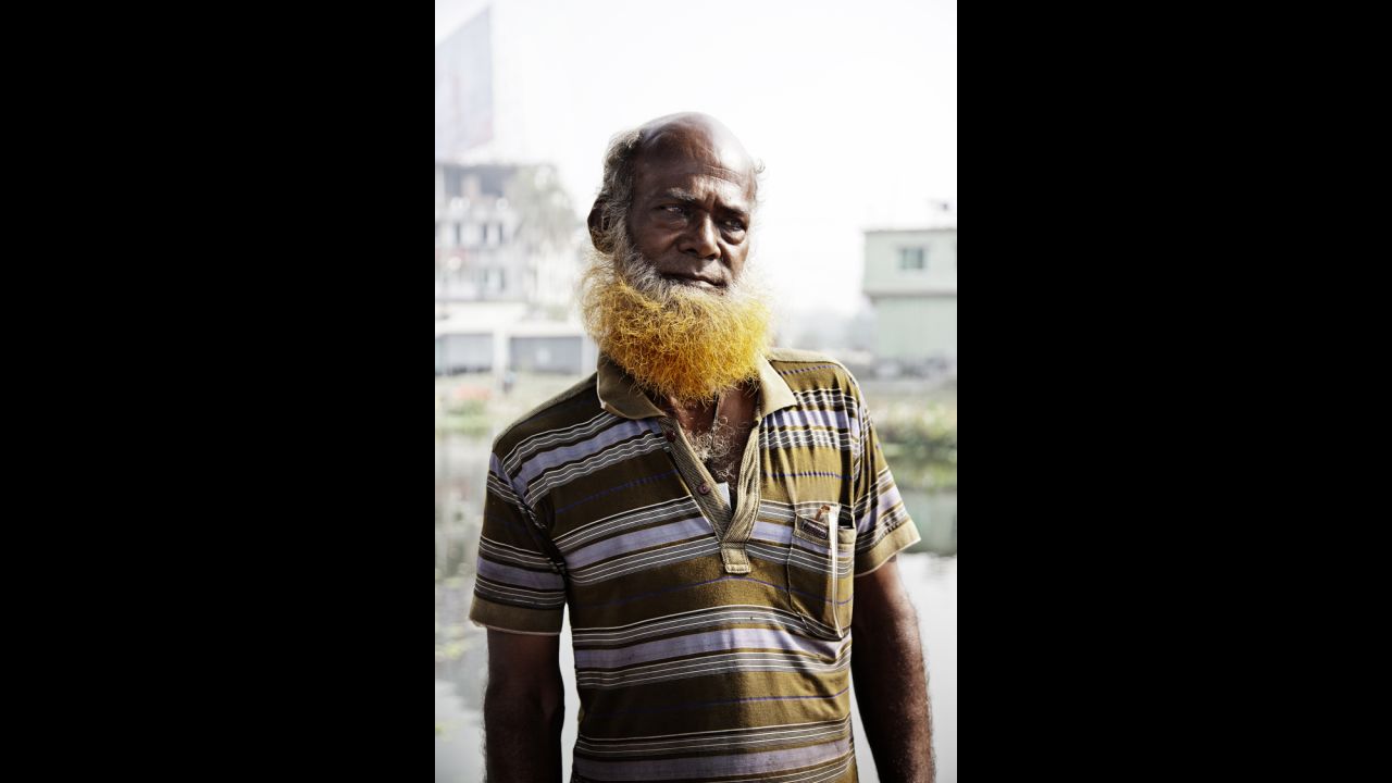 When he first arrived in Bangladesh, photographer Ernst Coppejans saw it everywhere: men who had dyed their hair or their facial hair orange.