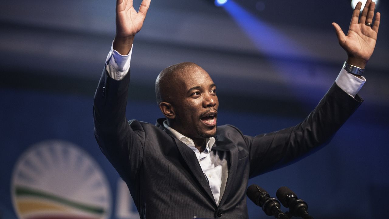 Mmusi Maimane, the newly elected leader of South Africa's main opposition Democratic Alliance (DA) party, gestures as he gives his maiden speech following his election in Port Elizabeth, South Africa, on May 10, 2015.