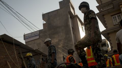 KATHMANDU, NEPAL - MAY 12: Nepalese Army work to try to dig up a little boy believed to be in the rubble of a house that collapsed following a second major earthquake May 12, 2015 in Kathmandu, Nepal. A 7.3 magnitude earthquake has struck in Nepal only two weeks after more than 8,000 people were killed in a devastating earthquake. The latest quake has struck near Mt Everest near the town of Namche Bazar. Tremors have been felt as far away as Bangladesh and Delhi. (Photo by Jonas Gratzer/Getty Images)
