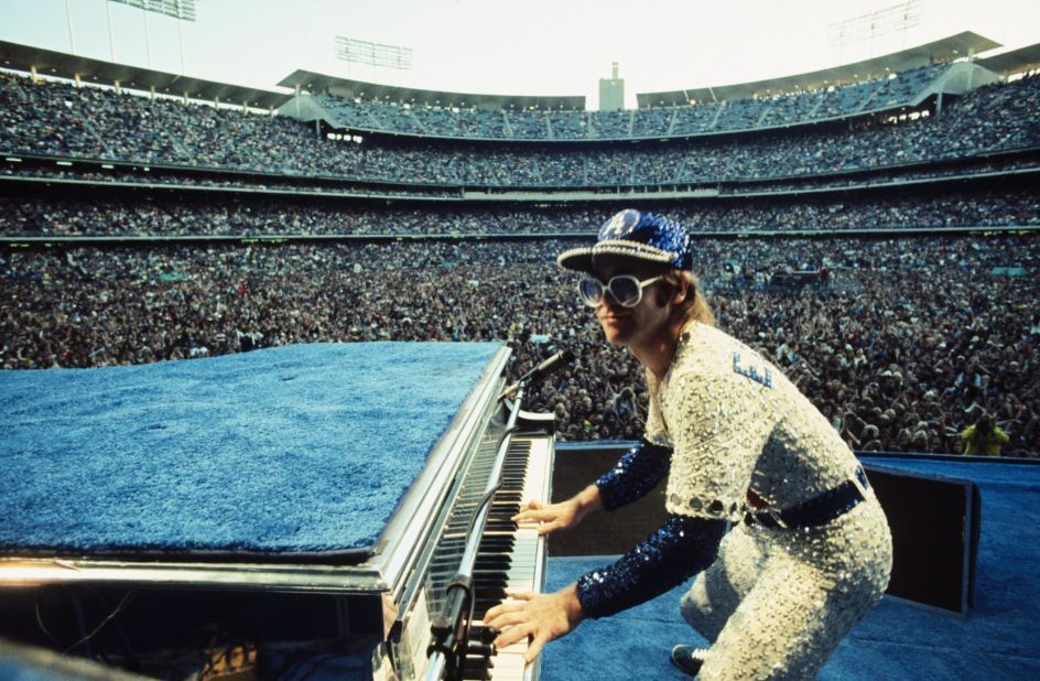 English singer Elton John, one of the biggest artists of the '70s, performed two sold-out shows at Los Angeles' Dodger Stadium in October 1975, performing for more than three hours each night. John, known for his flamboyant outfits and oversized sunglasses, was decked out for the occasion in a sequined Dodgers baseball uniform.