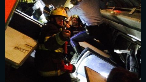 Former U.S. Rep. Patrick Murphy tweeted he was aboard the train when it crashed. "Helping others," he said. "Pray for those injured." Later he shared this photo that showed a firefighter inside the train.