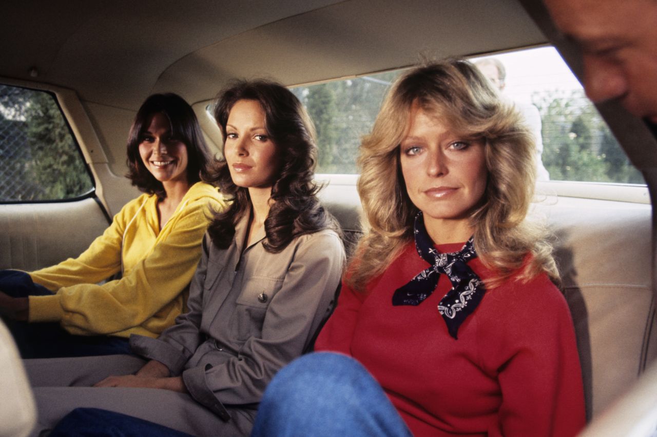 From left, Kate Jackson, Jaclyn Smith and Farrah Fawcett played a trio of private detectives known as "Charlie's Angels" in an ABC TV movie on March 21, 1976. Their series of the same name debuted that September. The show was part of a trend at ABC, along with "Three's Company" and the "The Love Boat," criticized by an NBC executive as "jiggle TV" -- shows built around the sex appeal of young women in revealing outfits. 