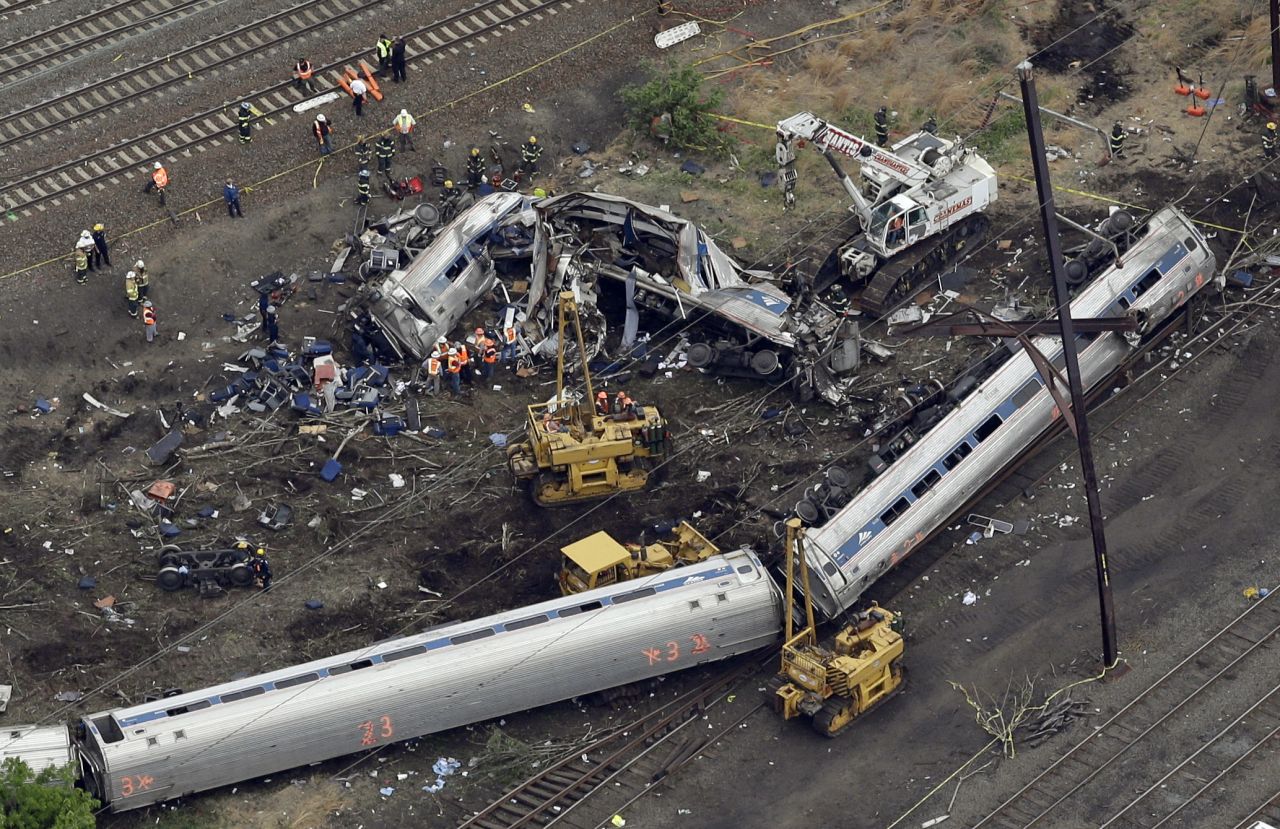 Emergency personnel work at the scene of a deadly train derailment in Philadelphia on Wednesday, May 13. An Amtrak train headed from Washington to New York City crashed Tuesday night in Philadelphia. Eight people were killed and more than 200 were injured.