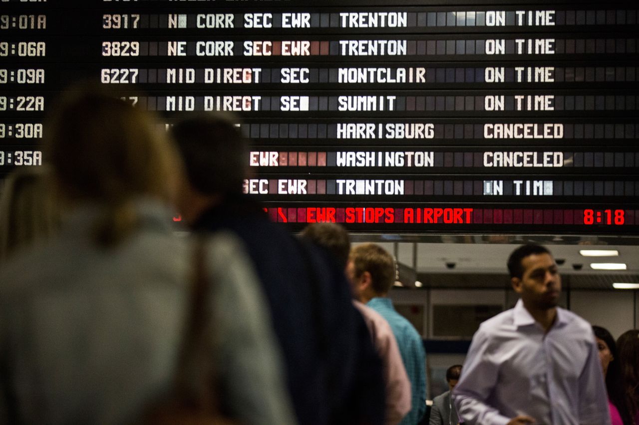 The Amtrak information board in New York shows the derailed train as canceled on May 13.