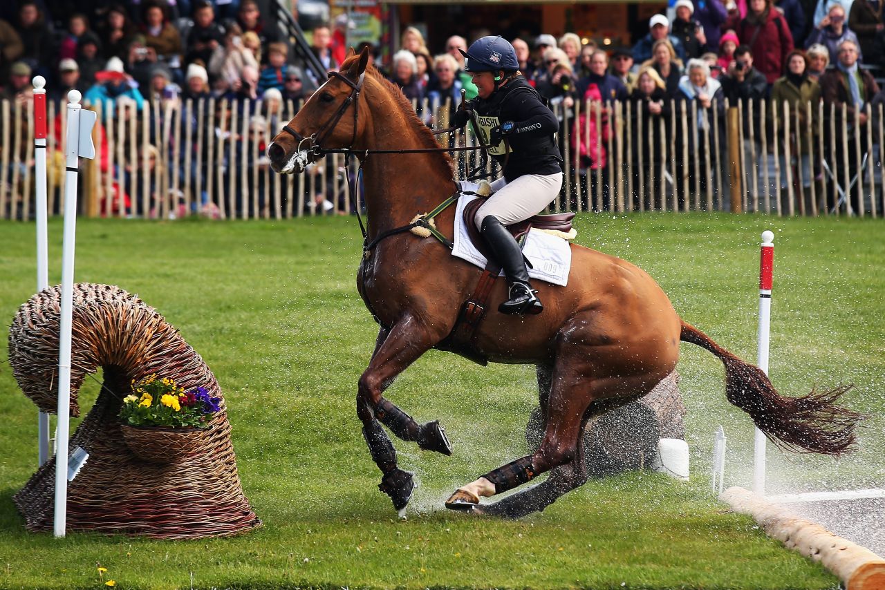 Britain's Pippa Funnell, regarded as one of three-day eventing's sporting elite, approaches a jump on horse Redesigned. They came in 12th place at the end of the championship.