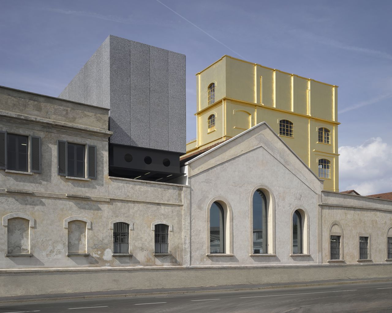 Fondazione Prada, which opened on May 9, was designed by Rem Koolhaas's architecture firm OMA. 