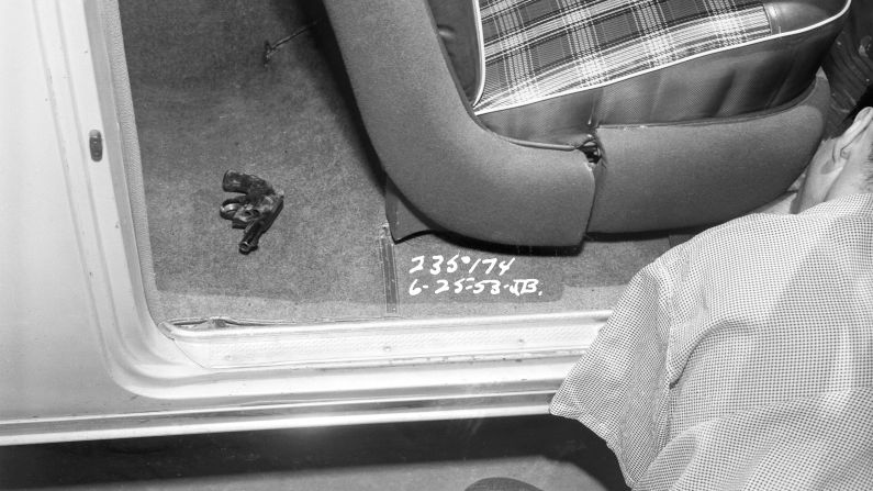 A .38-caliber Iver Johnson revolver sits in the back of a car where a 28-year-old man named George Delbert Greenberg killed himself in June 1953. "Despondency" was listed as the cause of the suicide, Ellroy wrote in the book.