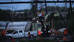Caption:PHILADELPHIA, PA - MAY 13: Repair crews inspect damages at the site of a train derailment accident May 13, 2015 in Philadelphia, Pennsylvania. Service has been interrupted after an Amtrak train derailed in Philadelphia last night, killing at least seven people and injured more than 200. (Photo by Alex Wong/Getty Images)