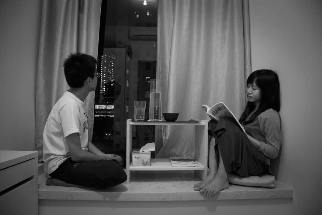 Yang Lulu and Bill Hong in their Hong Kong apartment. 