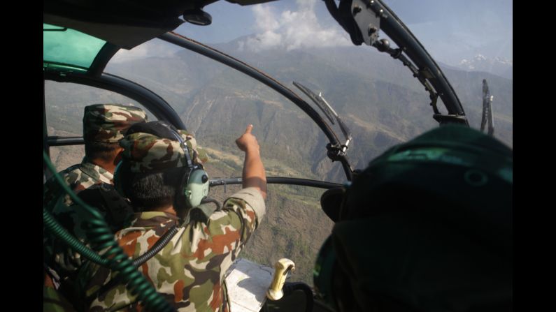 Members of the Nepalese Army search for a U.S. Marine helicopter in Nepal's Dolakha District on Thursday, May 14. The chopper went missing with six U.S. Marines and two Nepali service members on board.<a href="index.php?page=&url=http%3A%2F%2Fwww.cnn.com%2F2015%2F05%2F15%2Fasia%2Fus-helicopter-found-nepal%2Findex.html"> Three bodies were found in the helicopter's wreckage</a> on Friday, Nepal's defense secretary said.