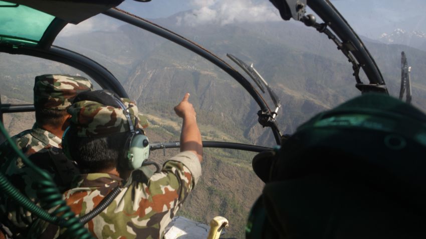 Nepalese army members search for a missing U.S. Marine helicopter in the Dolakha district of Nepal on Thursday, May 14.
