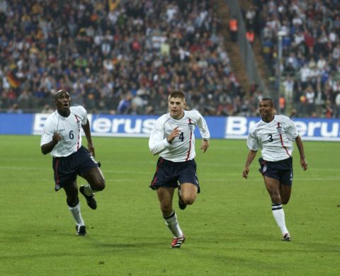 On an historic night in Munich, Gerrard wheels away in celebration after his goal during the 5-1 thumping of Germany. The win helped England on their way to qualification for the 2002 World Cup but he would miss out through injury.
