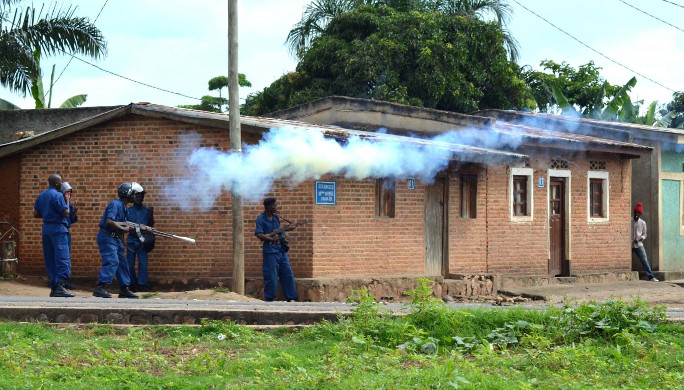 Smoke rises after security forces fired tear gas during a protest on May 12 in Bujumbura.