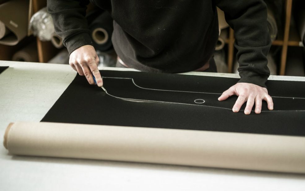 Upholstery is hand-stitched and made to measure.