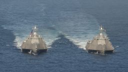 The USS Independence (LCS 2), left, and USS Coronado (LCS 4) steam in the Pacific Ocean. The two are of the Independence variant LCS. Ships of this variant are 416.8 feet in length with a beam of 103.7 feet and a displacement of 3,100 metric tons.