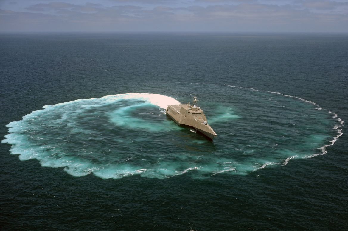 The littoral combat ship USS Independence (LCS 2) demonstrates its maneuvering capabilities in the Pacific Ocean off the coast of San Diego. LCS crew commander John Kochendorfer described the ships as "a military jet ski with a flight deck and a gun."
