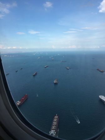 Strategy consultant Jenny Davis-Peccoud shot this image of container ships heading to the Port of Singapore. The port is the world's transshipment port.