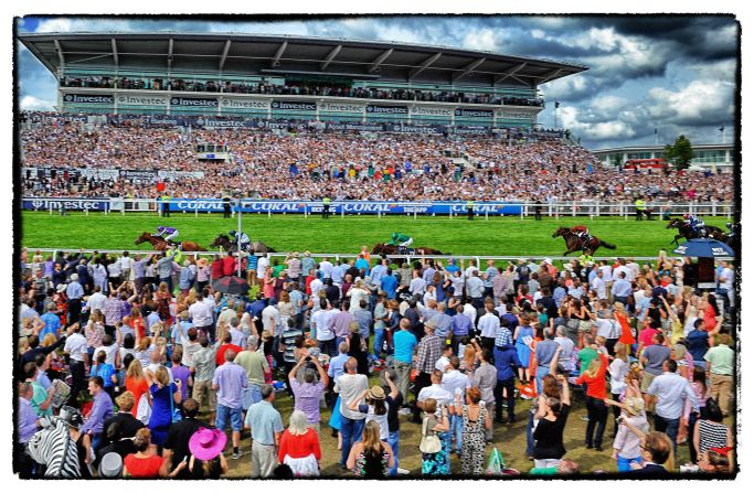 The crowd watches on as Joseph O'Brien rides Australia to victory last year, a horse trained by his father Aidan.