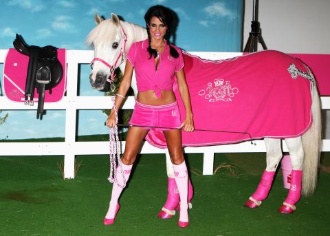 Pretty in pink. UK model, Katie Price, poses with a horse in her centerfold days.<br /><br />According to a recent profile in London's Evening Standard newspaper, Price's KP Equestrian leisurewear firm accounts for around 80% of the British equestrian clothes-wear market.