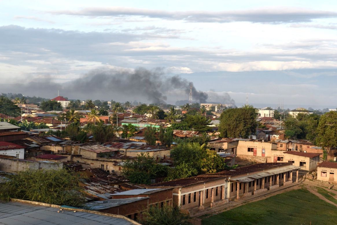 Smoke rises from several buildings near the port in Bujumbura on May 14.