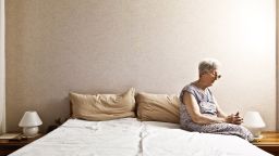 elderly woman bed