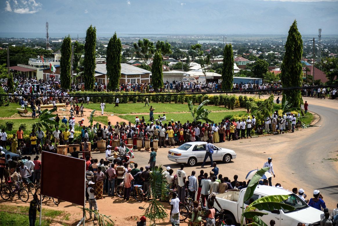 People line the streets as they celebrate the return of Nkurunziza on May 15. Burundian authorities said they arrested the military generals behind the attempted coup shortly after the President returned to the country.