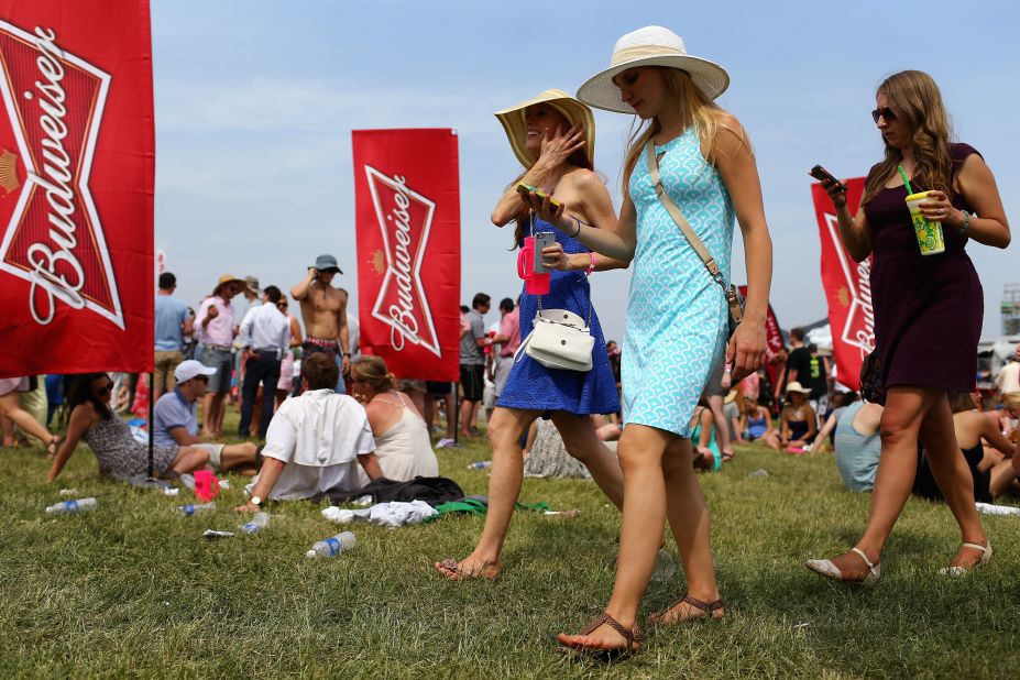  Race fans walk the Pimlico infield prior to the race, which was won by American Pharoah. 