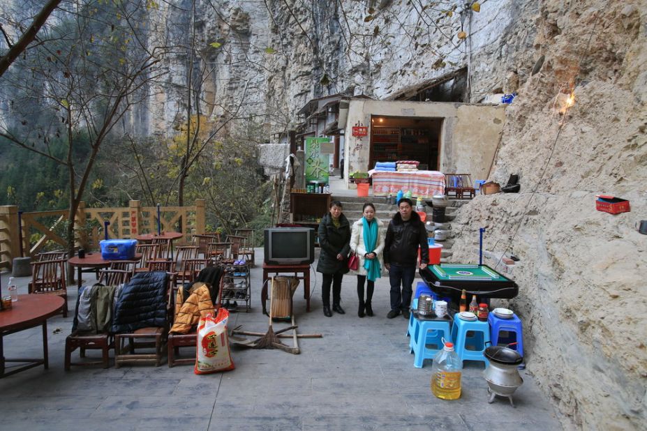 Zhang Jian and his wife live in a sinkhole, in Xiaozhai Village, Fengjie County in Chongqing. The Fengjie Sinkhole is one of the largest sinkholes in the world. In 1991, Zhan Jian was given the job of monitoring the water level of the river, so he moved to his new home inside the sinkhole.<br />