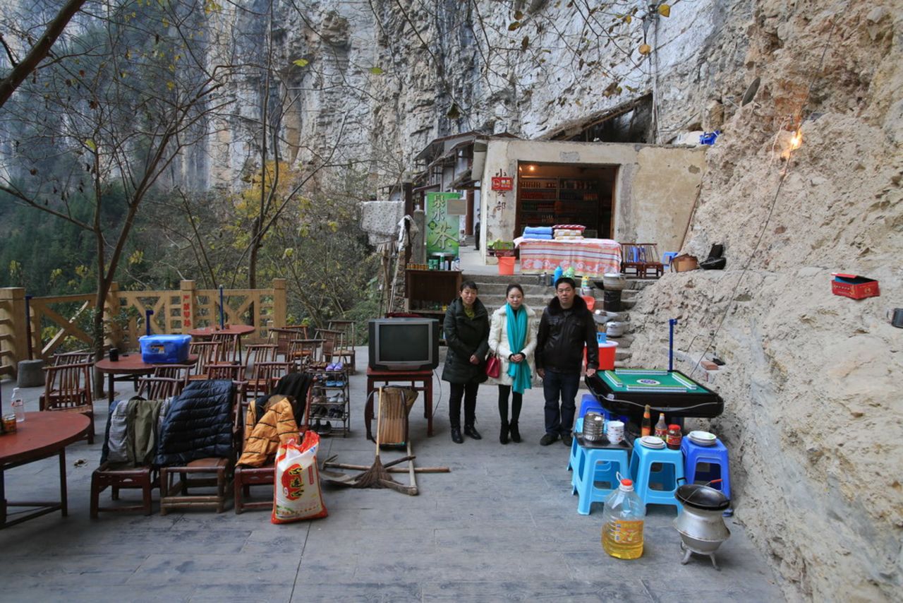 Zhang Jian and his wife live in a sinkhole, in Xiaozhai Village, Fengjie County in Chongqing. The Fengjie Sinkhole is one of the largest sinkholes in the world. In 1991, Zhan Jian was given the job of monitoring the water level of the river, so he moved to his new home inside the sinkhole.<br />