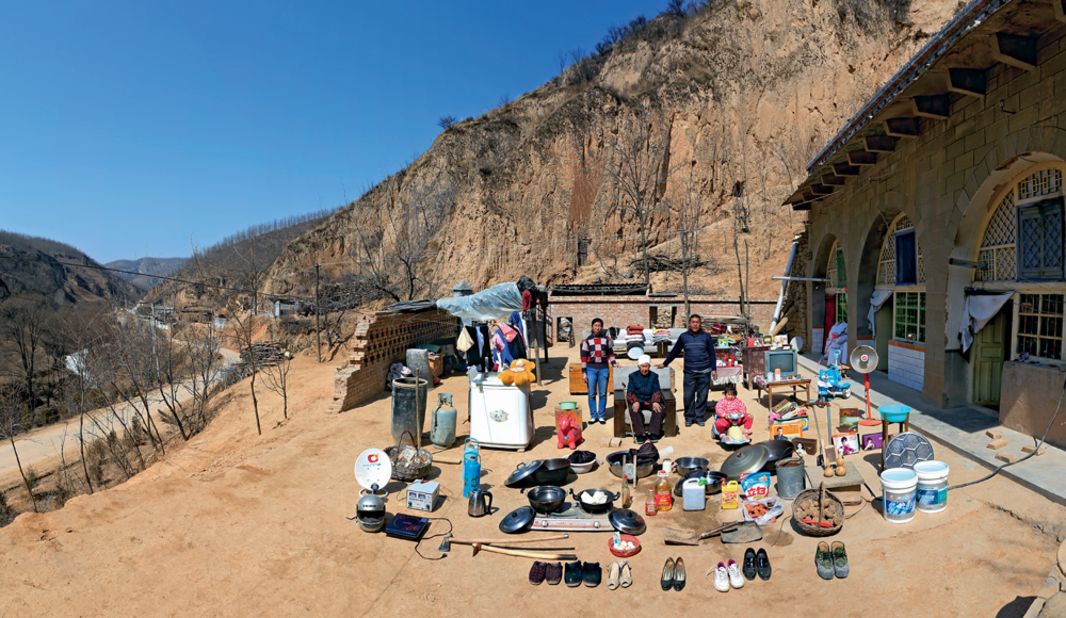 Feng Zhongcheng's family lives in a valley formed by mountain ridges, plains and loess hills in Xiaozhanghe village, Yan'an city in Shaanxi province. The family of five shares a total of five cave houses. Feng works in town, and he and his wife earn about 20,000 yuan ($3,216) per year.
