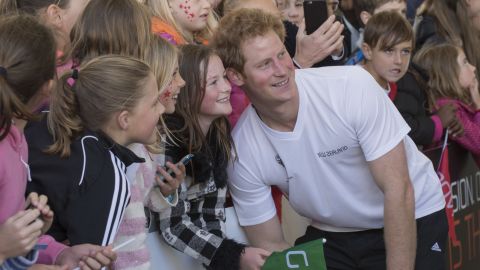 Prince Harry greets admirers in Auckland, New Zealand, on May 16.
