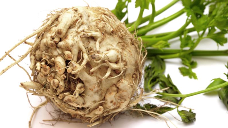No, don't toss it out. This unappetizing root is an excellent <a href="index.php?page=&url=http%3A%2F%2Fwww.fruitsandveggiesmorematters.org%2Fceleriac-nutrition-selection-storage" target="_blank" target="_blank">source</a> of vitamins C and K, and it has no fat or cholesterol. It also is a good way to get some manganese, potassium, phosphorous and -- what else -- fiber into your diet.  Make roasted celery root "chips," grate it raw into a salad, or do the old-fashioned mash. It pairs well with apples or potatoes. The nutty flavor of cooked celery root also complements fish dishes.